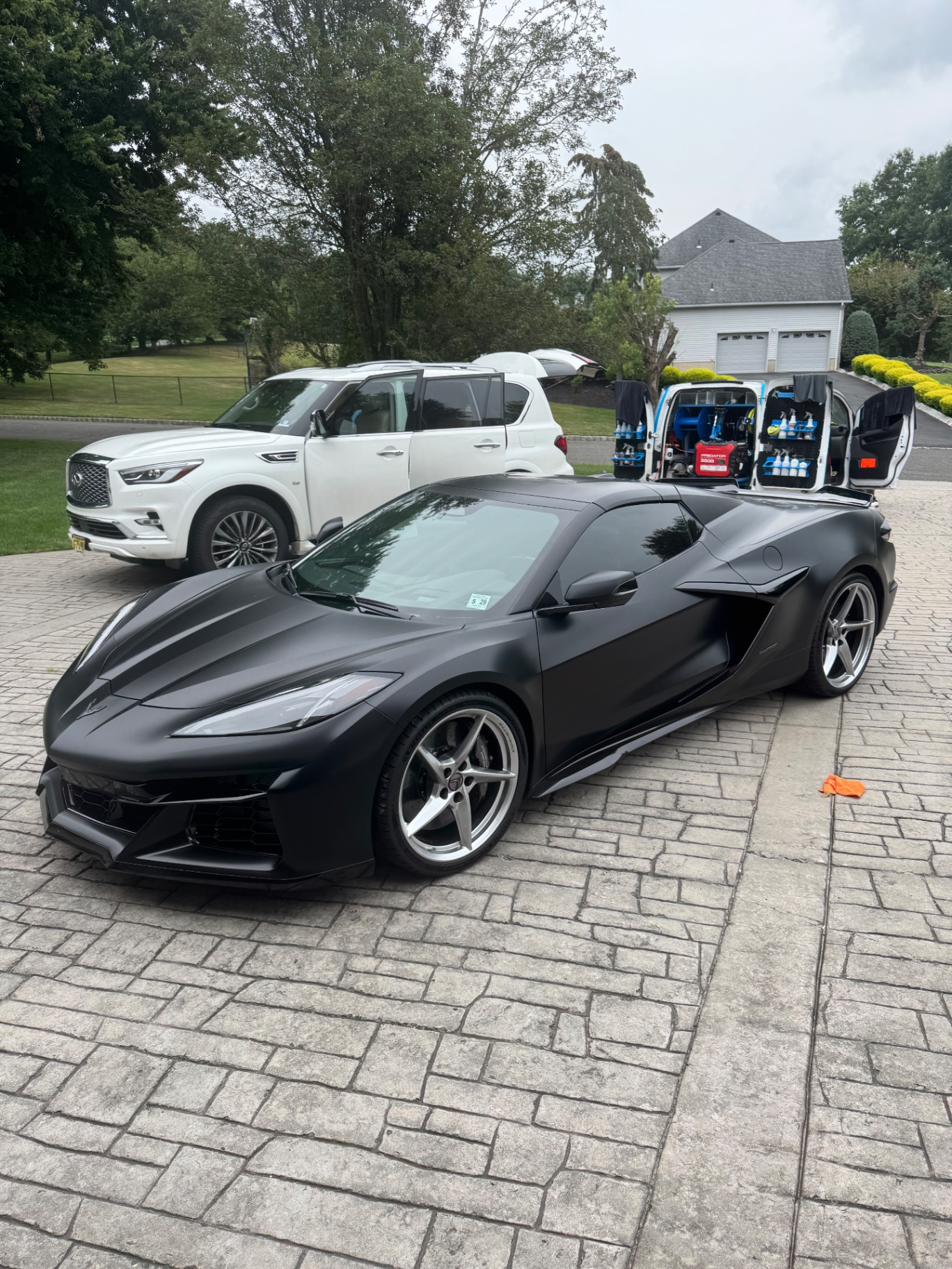 Satin black Corvette Z06 mobile detail by Monmouth Detail Co in a Monmouth County, NJ driveway