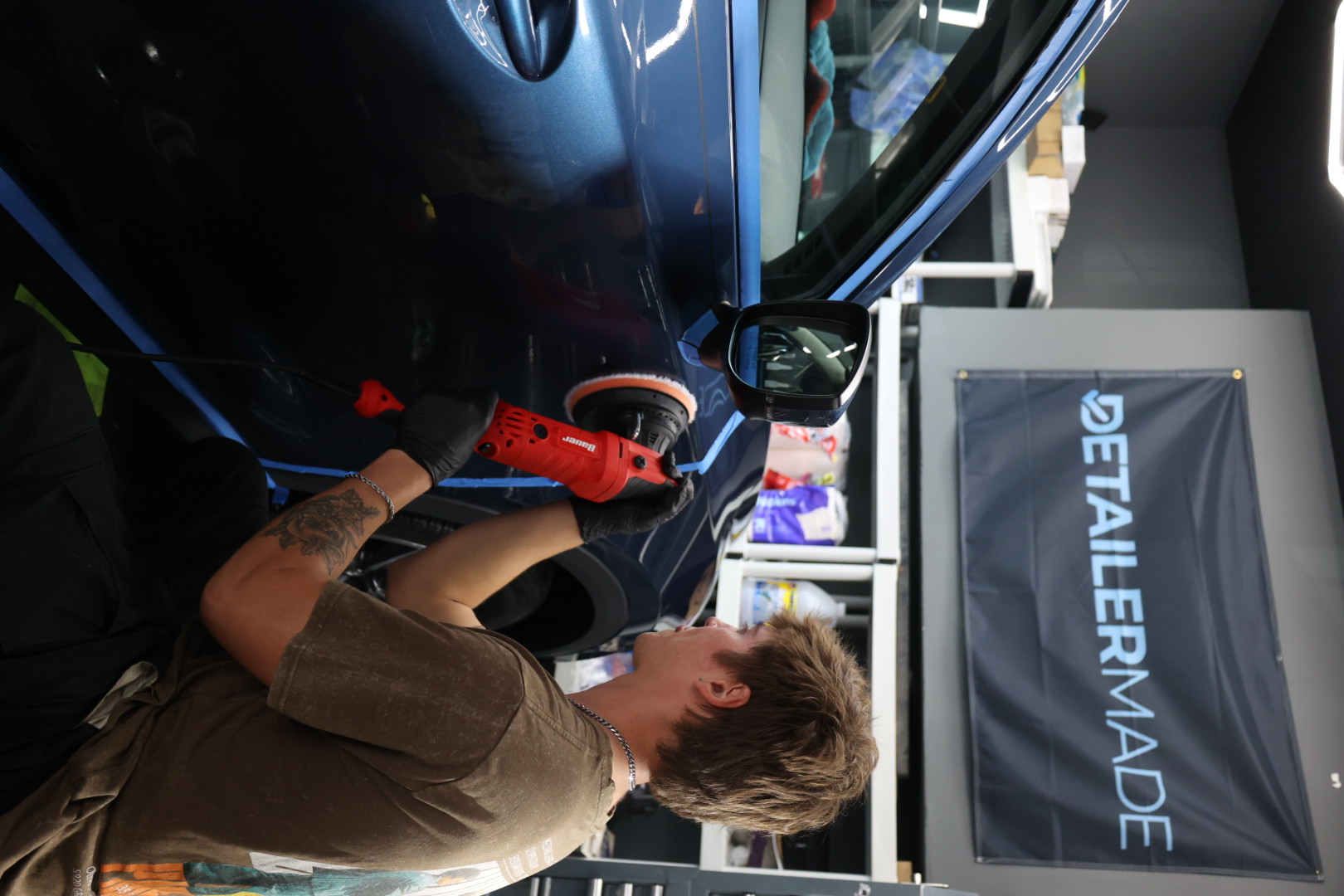 Multi-stage paint correction on a blue SUV inside the Monmouth Detail Co detailing studio in NJ
