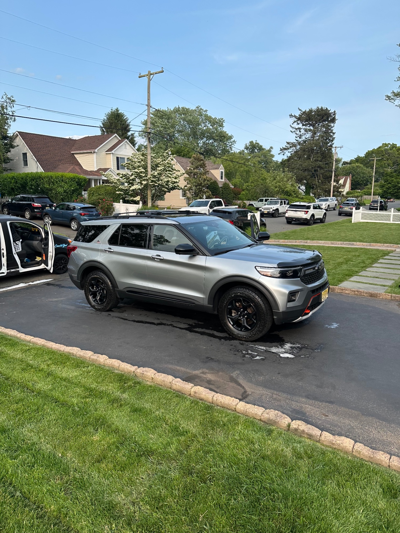 Silver Ford Explorer Timberline mobile detail by Monmouth Detail Co in a Monmouth County, NJ driveway