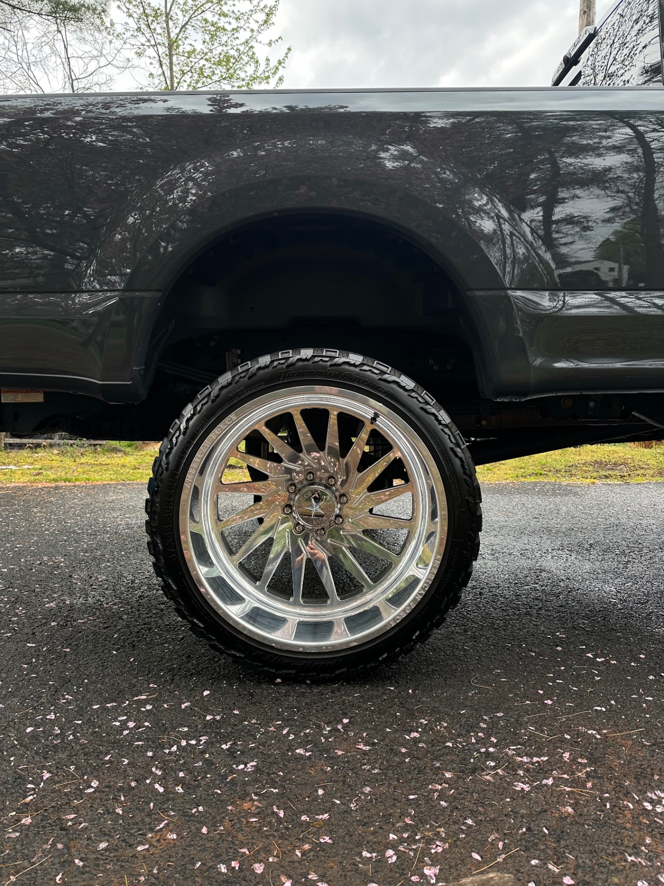 Lifted truck wheel detail with polished American Force wheels by Monmouth Detail Co in Monmouth County, NJ